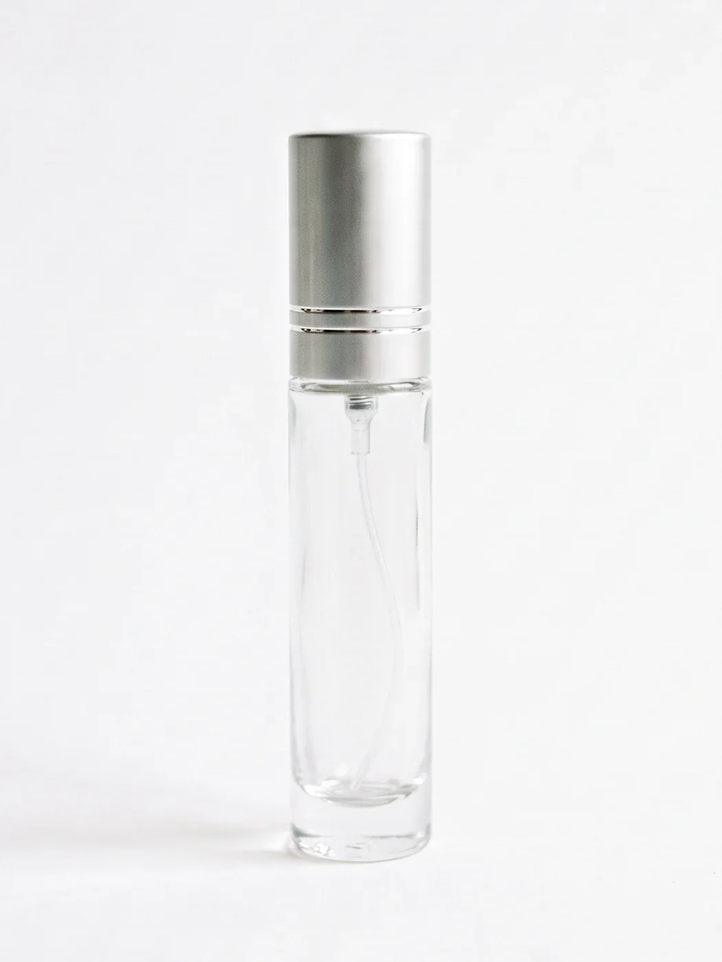 A neet. glass atomizer, filling with perfume